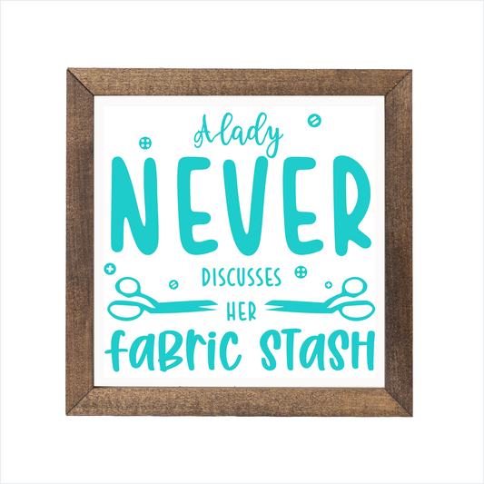 A lady never discusses her fabric stash sign | UV printed | wood frame